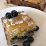 Blueberry square with passion fruit syrup